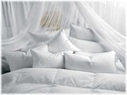 Подушки и одеяла